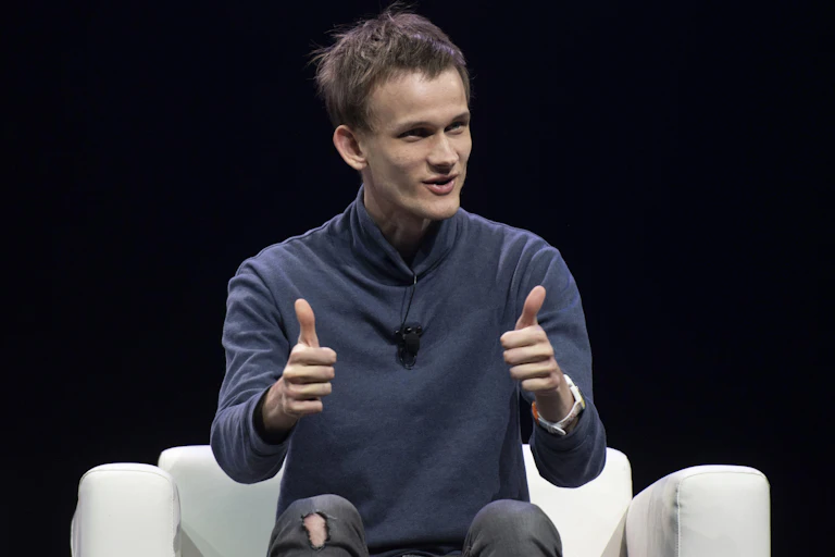 Vitalik Buterin with his thumbs up