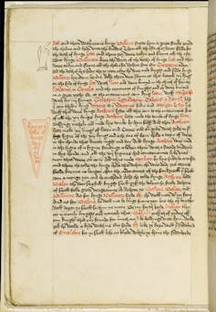 A page of text featuring scribbles and drawings.