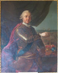 Portrait of a man in 18th century armour next to a crown on a table