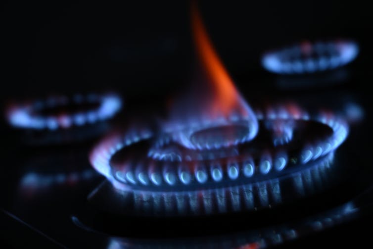 Burning gas element on stove