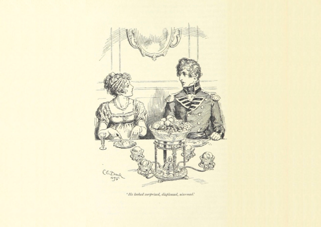 A man and woman talk at the dinner table. 