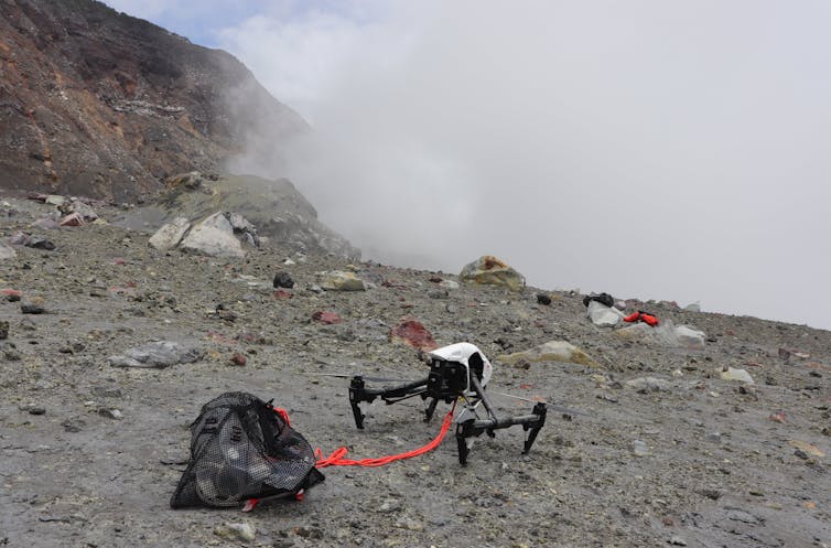 A drone landed in front of smoke