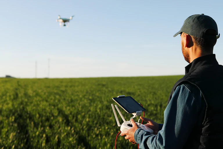 Farmer operating drone