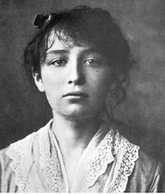 A black and white image of French sculptor Camille Claudel.