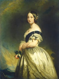 Painting of young Queen Victoria wearing a white gown and holding roses in her hands, looking over her shoulder