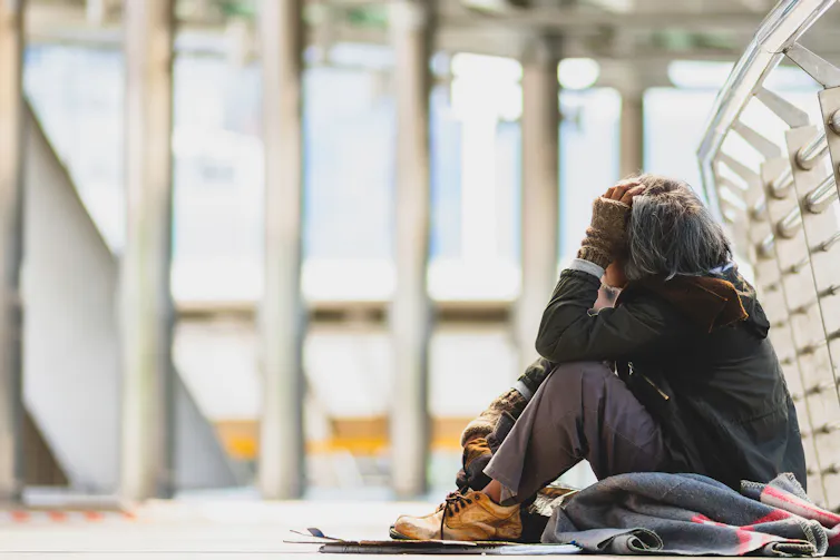 Person sitting on the ground