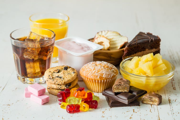 Lots of sweet foods on a table.