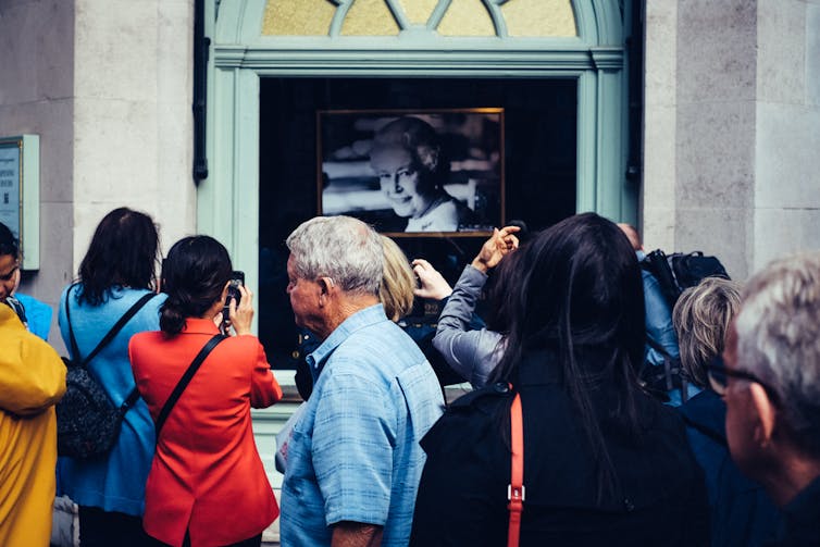 Tourists outside Fortnum & Mason on Piccadilly