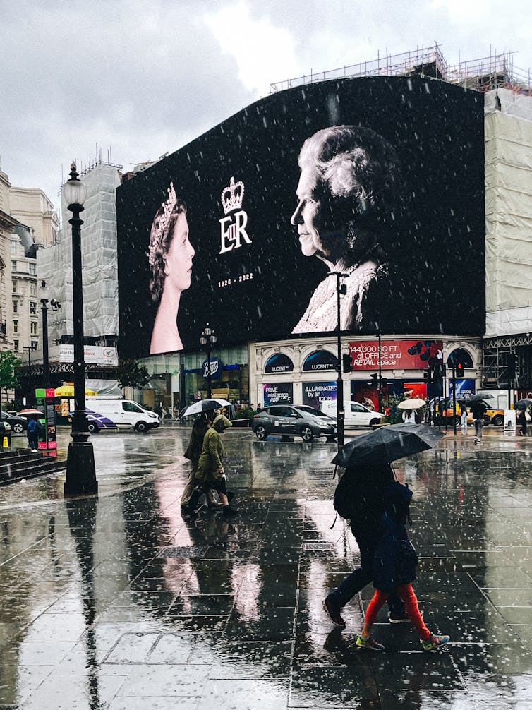 A tribute to Queen Elizabeth II at London’s Piccadilly Circus on the first day of national mourning