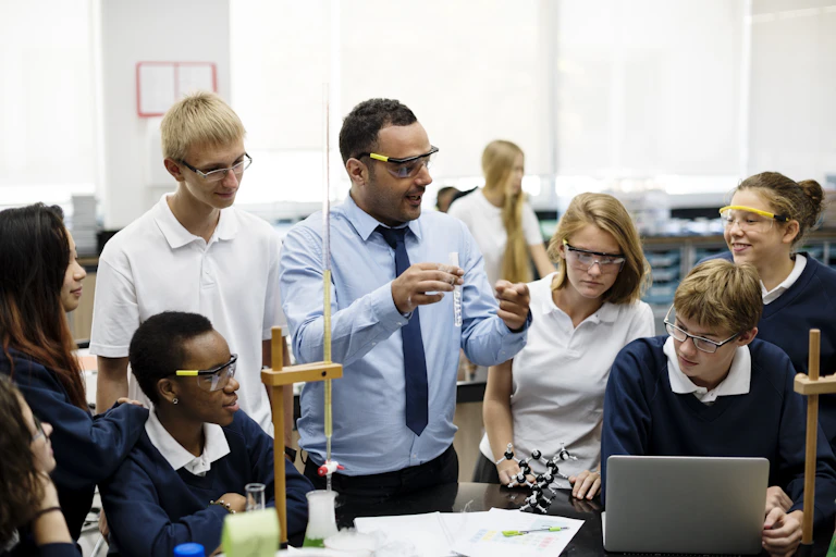Chemistry teacher with students.