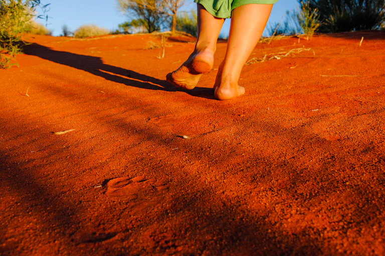 walking away red sand