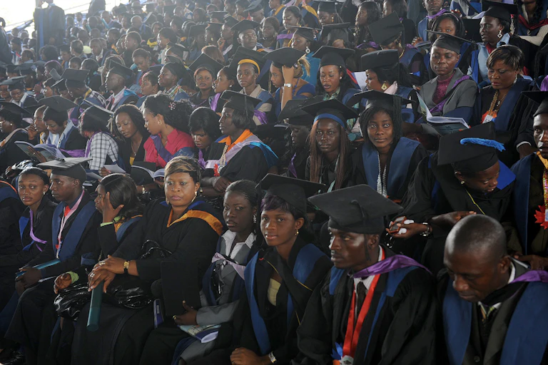 Graduate students listen to Nigerian President Goodluck Jonathan's (unseen) speech during his visit at his alma mater in the University of Port Harcourt in Rivers State on, May 15, 2010.