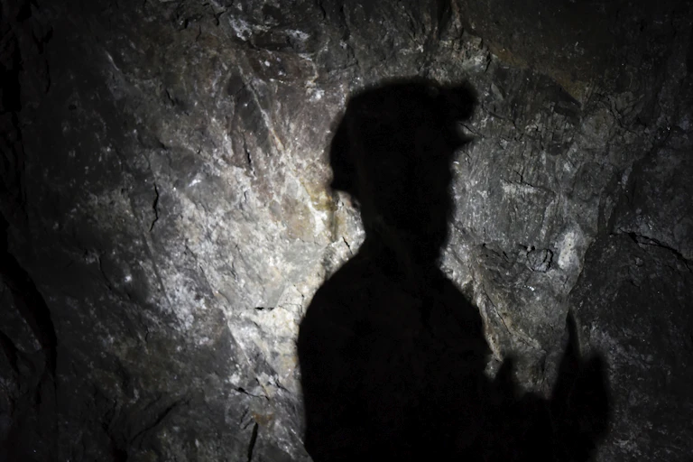 Silhouette of a miner