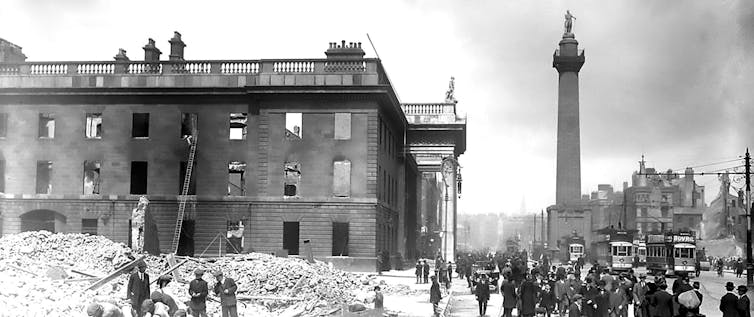 Black and white image of a building in ruins.