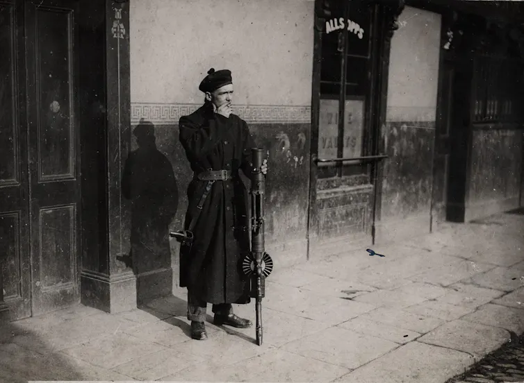 Old image of a soldier smoking.