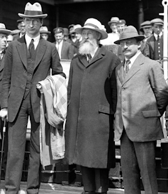 Black and white photograph of a group of men.