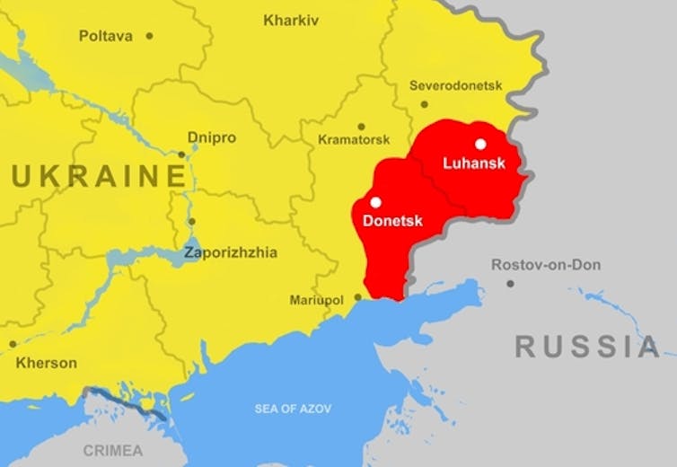 Map of the Russian and Ukrainian borders in yellow, and occupied territory in red.