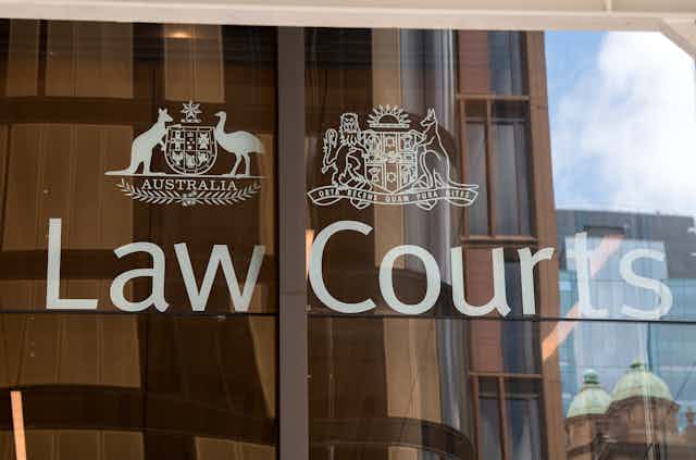 A sign on the NSW Supreme Court says 'Law Courts'