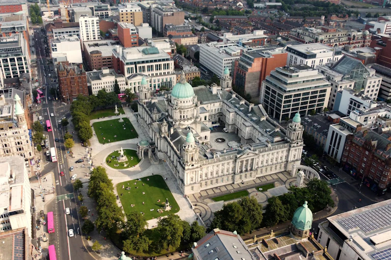 An overhead view of city buildings and streets.