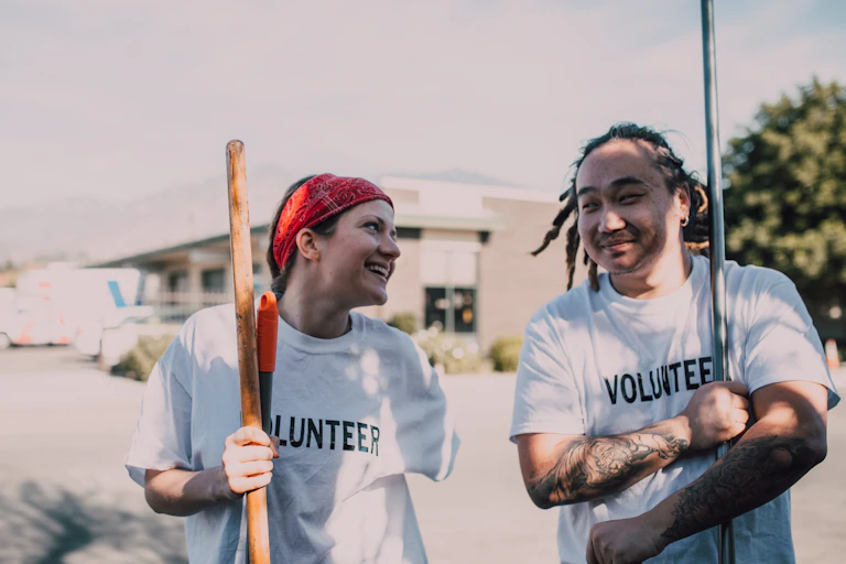 People seen in volunteer shirts.