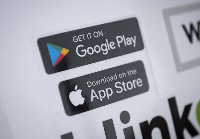 close-up of a computer screen centered on to black rectangles with white text on them