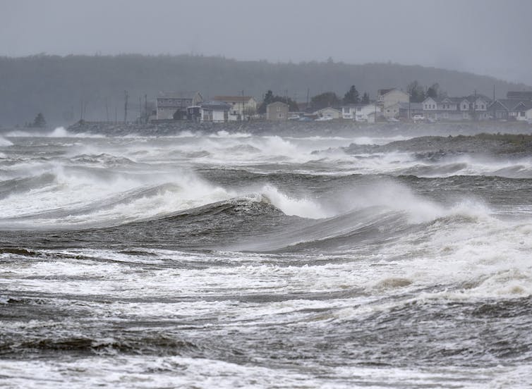 a photograph of an agitated ocean with high waves