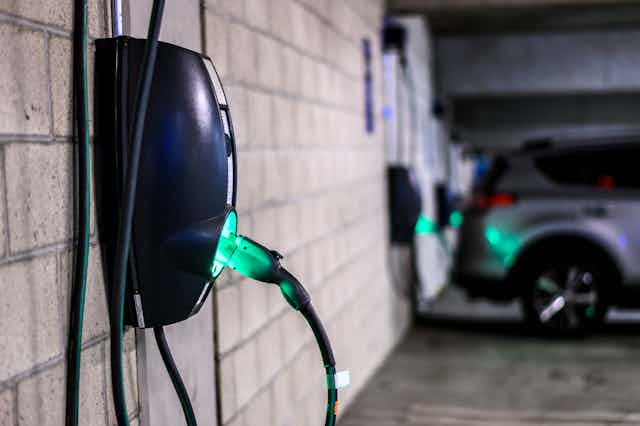 Charging units on the interior wall of a large garage