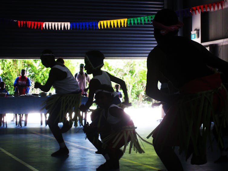 children dance in traditional dress