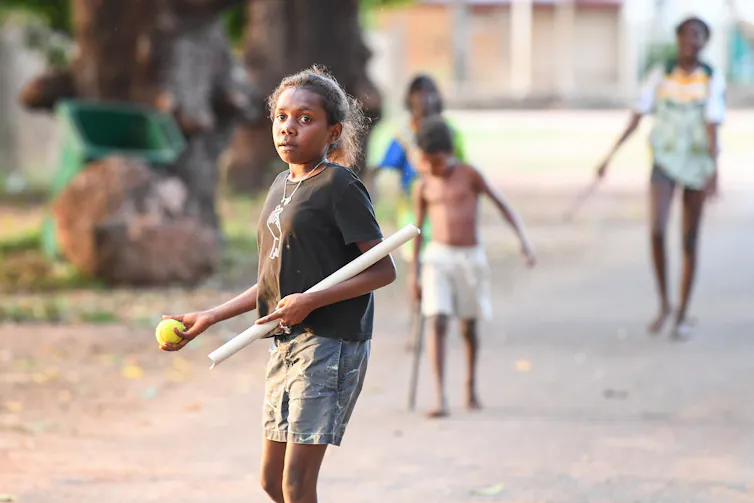 Aurukun young girl playing games