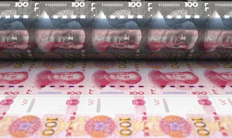 A sheet of Chinese yuan cash being printed
