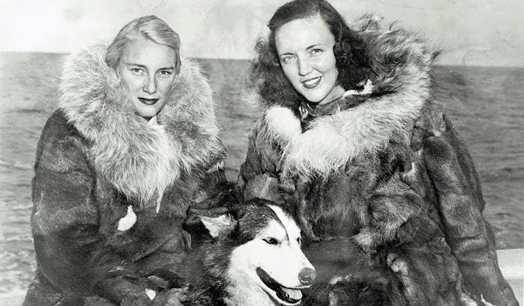 Two women and a dog