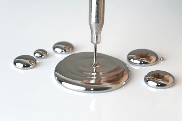 Droplets of silvery liquid metal