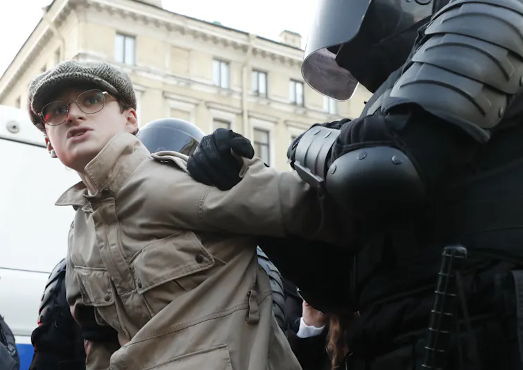 A young man is arrested at a St Petersburg protest about mobilisation.
