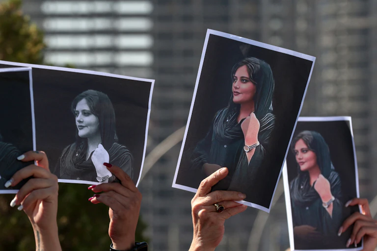 Three photographs of Mahsa Amini, who died in custody recently in Iran.