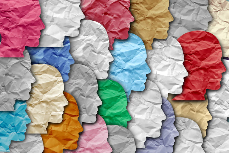 A collage of colourful heads.