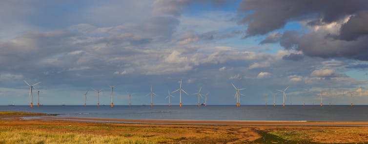 Offshore wind farm viewed from a beach