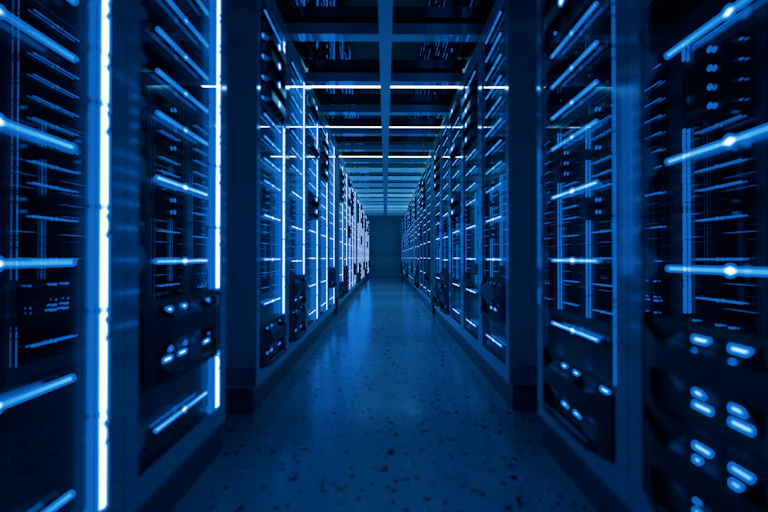 Dimly-lit computers in warehouse