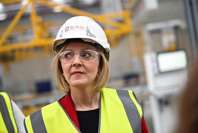 Liz Truss wearing a hard hat and goggles.