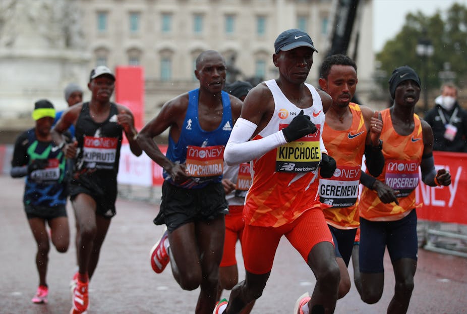 A group of professional runners during the 2020 London marathon. Eliud Kipchoge leads the pack.