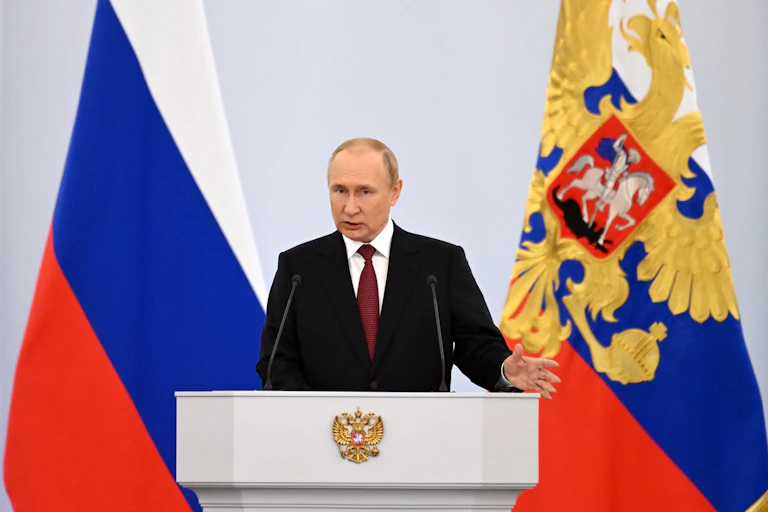 Russian President Vladimir Putin speaks during a ceremony to sign treaties on new territories' accession to Russia at the Grand Kremlin Palace in Moscow