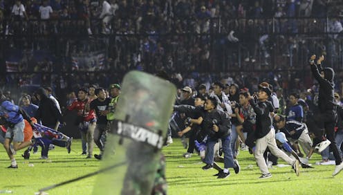 an expert explains what led to the soccer stampede in Indonesia