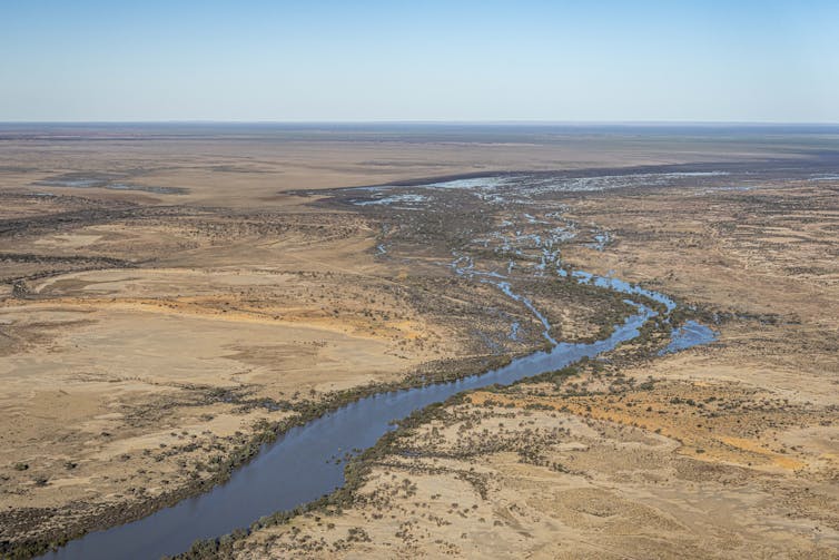 River winds through arid landscape