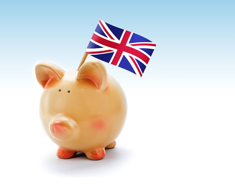 Piggy bank with a Union Jack sticking out