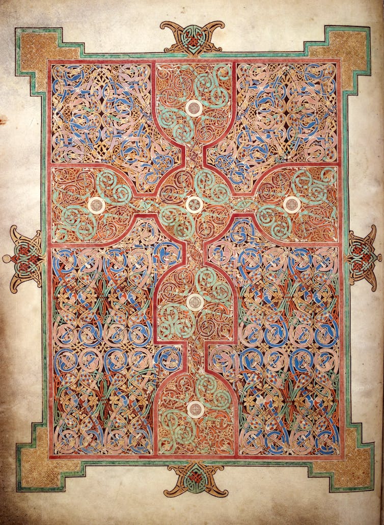 A highly decorative page from an illuminated manuscript.