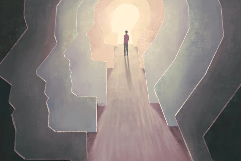 Concept art person within numerous heads.