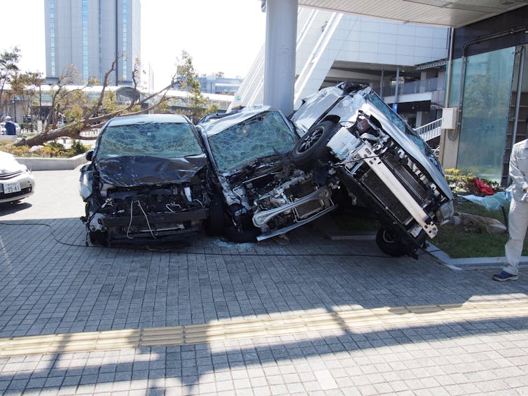 Three cars smashed up in the street