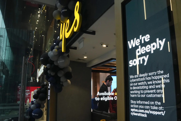 Sign outside an Optus store