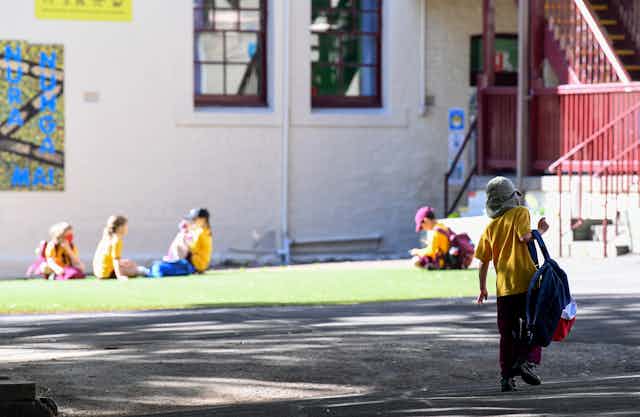 Students in the school playground. 