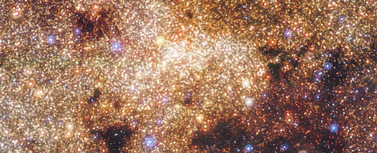 Questa immagine presenta un primo piano di un'immagine nel vicino infrarosso ad ampio campo della regione centrale della Via Lattea