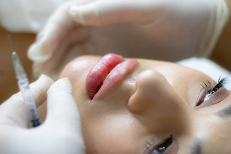 woman getting injection in face